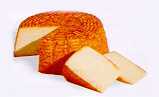 Muenster; Edible orange rind with white interior, creamy texture