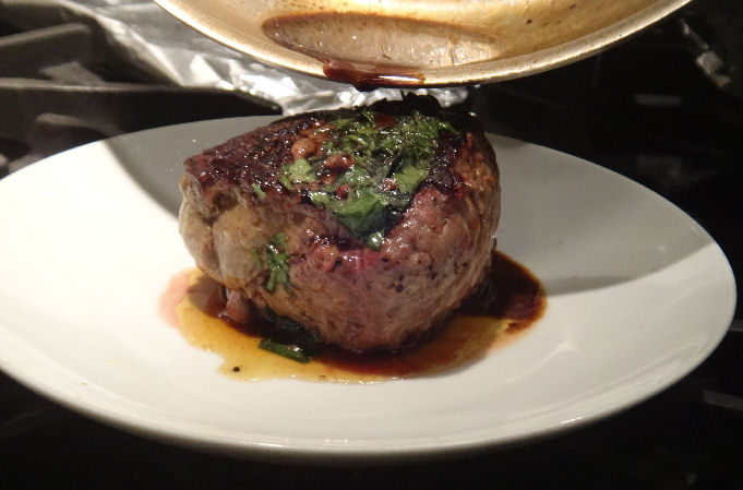 Pouring Pan Juices over the Steak