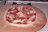 pizza ready to go in the oven